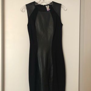 Cache black dress with faux leather panel.